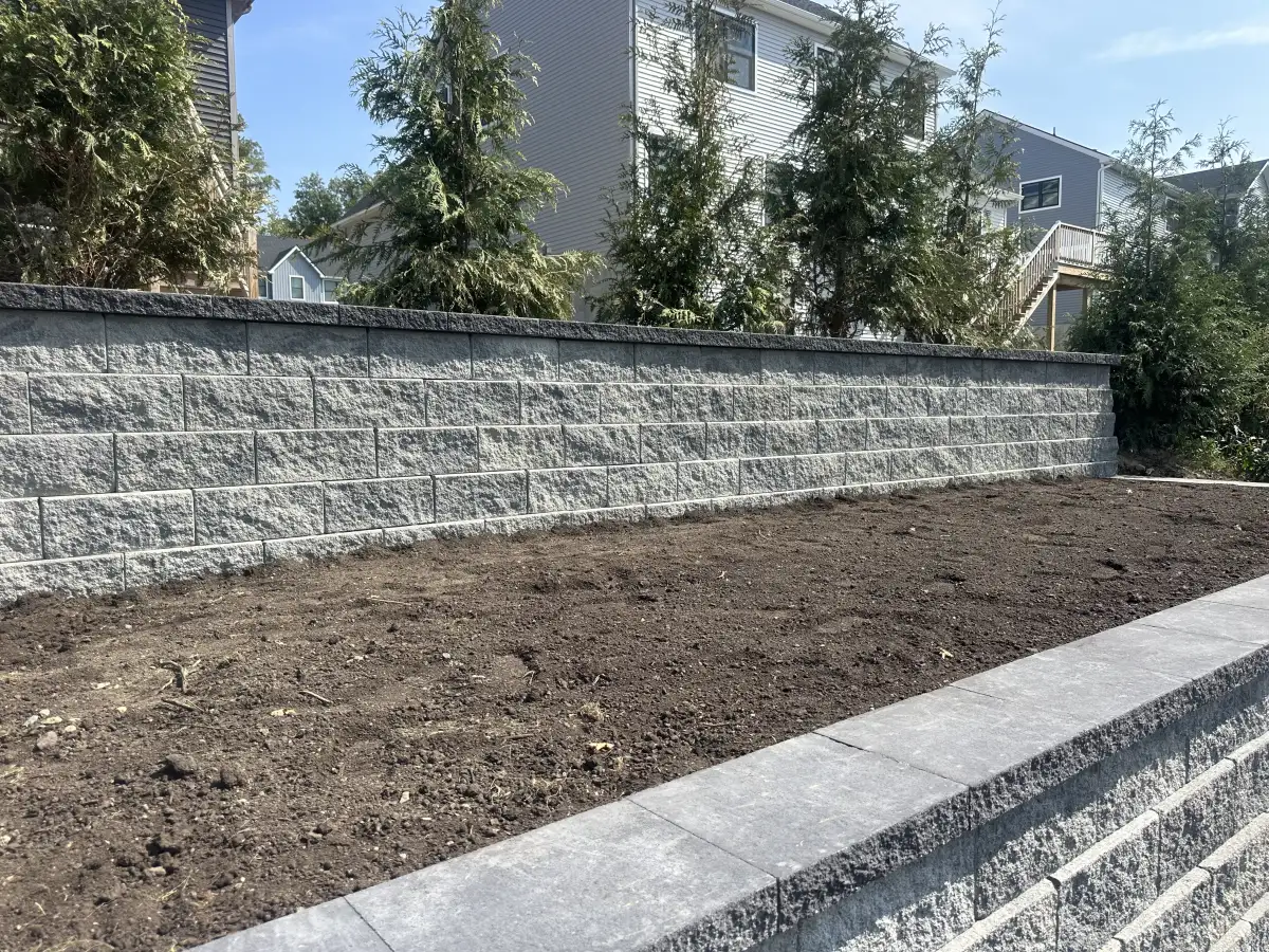 Unilock paver patio with sitting wall in the Hudson Valley
