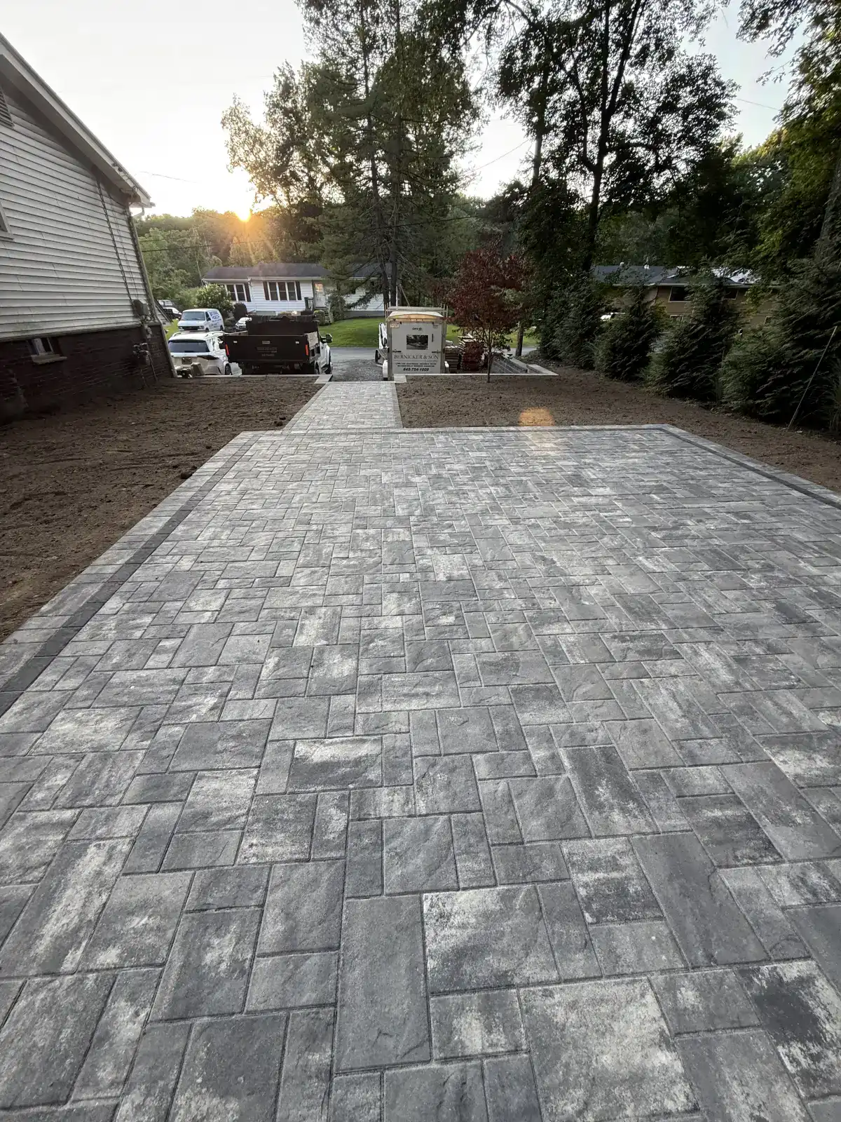Finished paver patio and walkway with a contrasting border